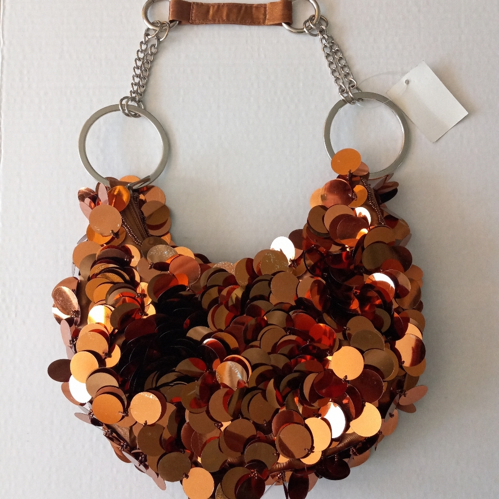 Copper Ring purse with bronze & silver colored chunky handle